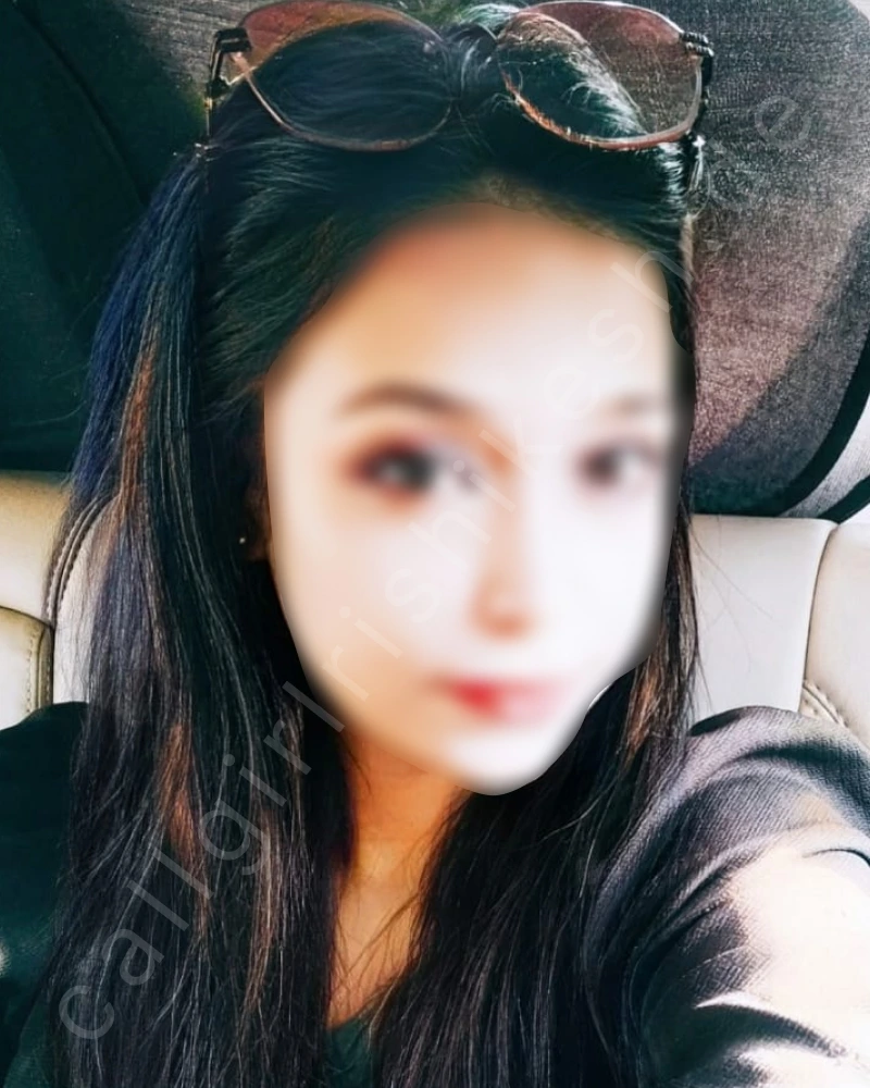 VIP Rishikesh Call girl siting on a car back seat and taking selfiee